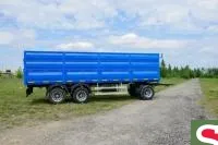 Самосвальный прицеп зерновоз 8499 ЗС ГИБРИД г/п 18т. (28,5 м3) 3 оси